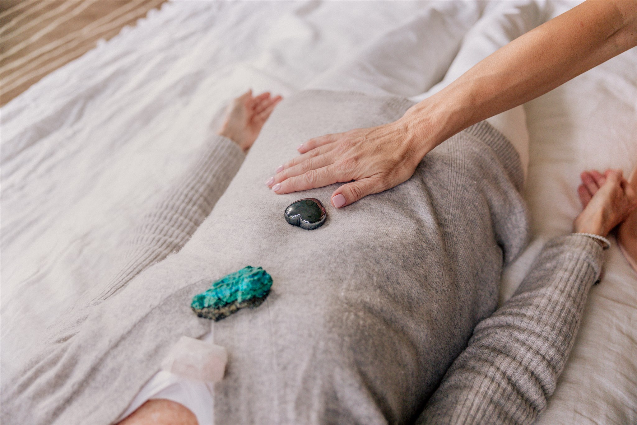 Christine Grace offering a private Reiki session